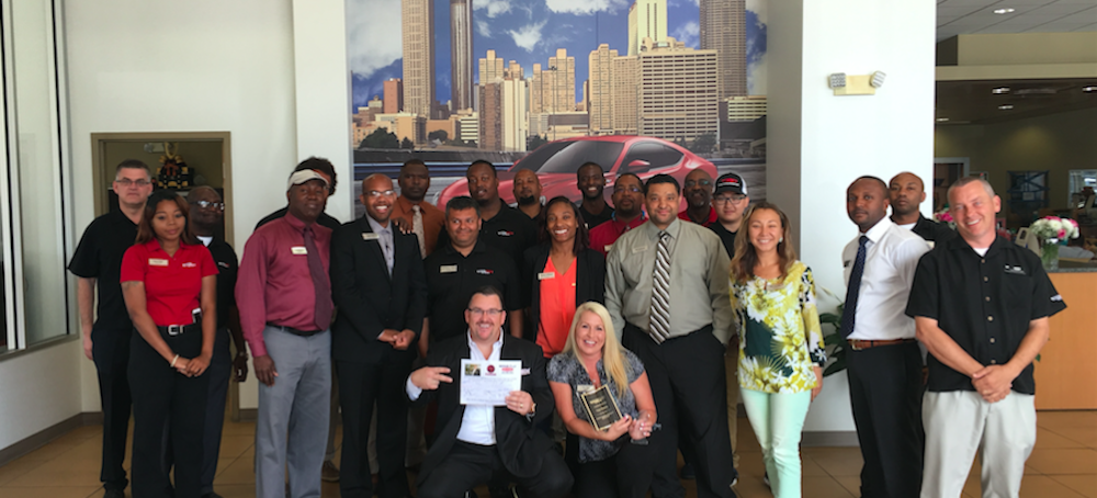 Toyota South Atlanta employees receiving an award